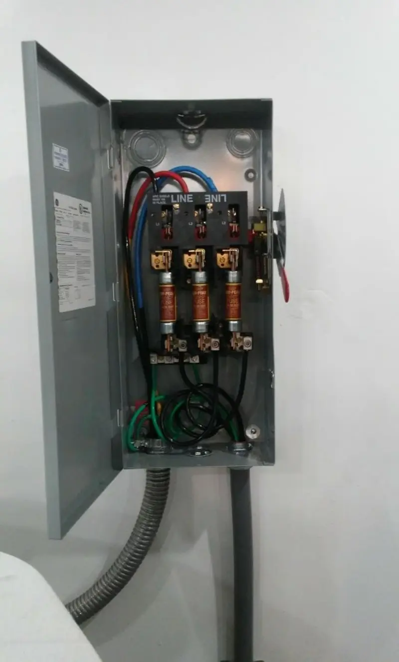 Three-phase disconnect switch installed for Smoke Detector Installation in Salina